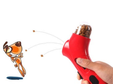 Loading a treat into the launcher