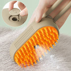 Steam pet brush lifting loose fur