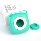 Open base of the bath brush showing the shampoo reservoir