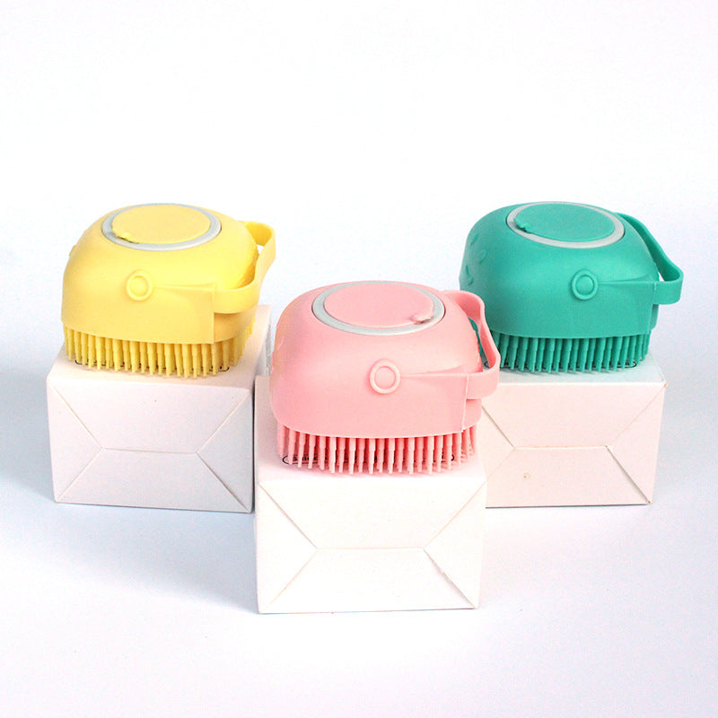 Bath brushes in yellow, pink and green